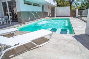 Bazén v ubytování Hotel Cola Frontemare nebo v jeho okolí