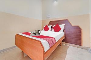 Postel nebo postele na pokoji v ubytování Hotel O City Lodge + 17 fotografií