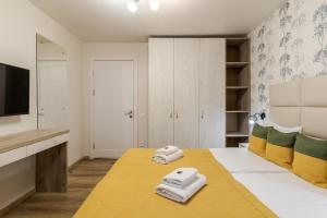 Posteľ alebo postele v izbe v ubytovaní DeMar Apart Sun
