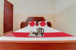 Postel nebo postele na pokoji v ubytování Hotel O City Lodge