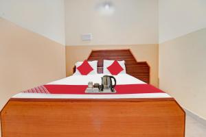Postel nebo postele na pokoji v ubytování Hotel O City Lodge