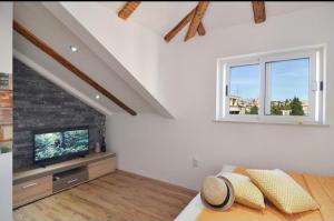 Μια τηλεόραση ή/και κέντρο ψυχαγωγίας στο Beach GABRIELA Center