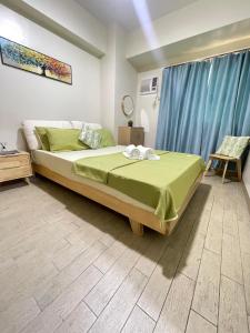 Postel nebo postele na pokoji v ubytování DH Suites
