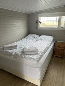 Postel nebo postele na pokoji v ubytování Cozy Kálfhóll in South Iceland