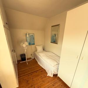 Postel nebo postele na pokoji v ubytování Vesterbro Apartment