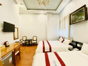 Sjónvarps- og/eða afþreyingartæki á Hoa Dat Da Lat Hotel