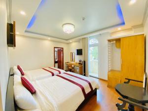 Sjónvarps- og/eða afþreyingartæki á Hoa Dat Da Lat Hotel