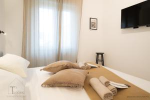 Postel nebo postele na pokoji v ubytování Turchetti's Rooms