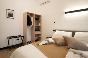 Postel nebo postele na pokoji v ubytování Turchetti's Rooms