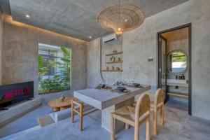 Un lugar para sentarse en 2 bedroom entire place Isa Villa Uluwatu