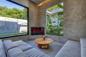 Un lugar para sentarse en 2 bedroom entire place Isa Villa Uluwatu