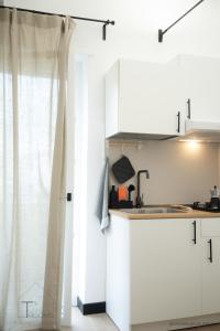 Kuchyň nebo kuchyňský kout v ubytování Turchetti's Rooms