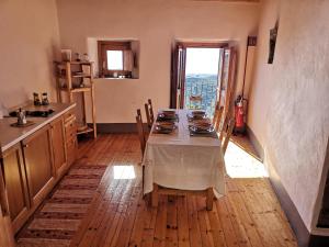 A kitchen or kitchenette at Case Rurali Pentedattilo