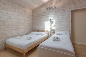 Posteľ alebo postele v izbe v ubytovaní Le Zen - Sauna - Piscine intérieure