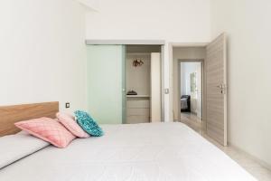 A bed or beds in a room at La casa sull'albero City Life