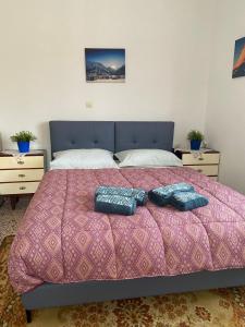 Postel nebo postele na pokoji v ubytování Aegean House
