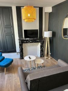 Μια τηλεόραση ή/και κέντρο ψυχαγωγίας στο Gîte Cosy - 35 m2 - T2 Hyper Centre - Tout équipé