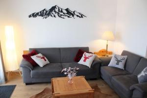 Posezení v ubytování Ferienhaus Nr 17, Kategorie Komfort, Feriendorf Hochbergle, Allgäu