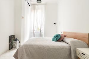 A bed or beds in a room at La casa sull'albero City Life