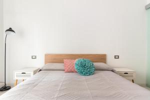 A bed or beds in a room at La casa sull'albero City Life