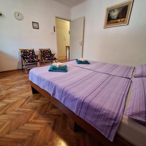 A bed or beds in a room at Apartment Fleger Obala