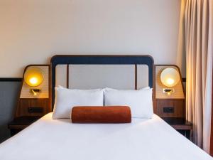 Postel nebo postele na pokoji v ubytování Mercure Gdynia Centrum