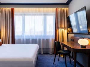 Postel nebo postele na pokoji v ubytování Mercure Gdynia Centrum