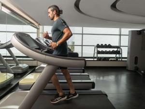 a man on a treadmill in a gym at Sofitel Casablanca Tour Blanche in Casablanca +37 photos