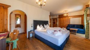 Posteľ alebo postele v izbe v ubytovaní Romantik Hotel Santer
