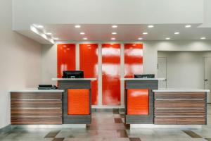 an office with orange and brown counters in a room at Quality Inn & Suites Vacaville in Vacaville +25 photos