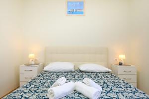 Postel nebo postele na pokoji v ubytování Spacious 4 Bedroom Dubrovnik Apartment