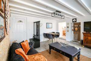 TV a/nebo společenská místnost v ubytování L'échappatoire - A 300 m de la plage