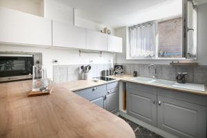 Kuchyň nebo kuchyňský kout v ubytování L'échappatoire - A 300 m de la plage