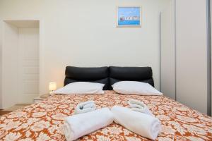 Postel nebo postele na pokoji v ubytování Spacious 4 Bedroom Dubrovnik Apartment