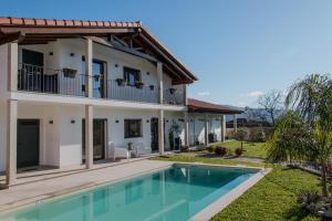 an image of a villa with a swimming pool at Casa Serra De Soajo in Soajo