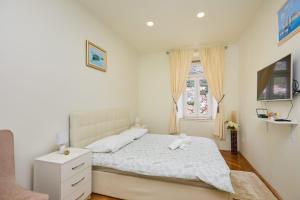 Postel nebo postele na pokoji v ubytování Spacious 4 Bedroom Dubrovnik Apartment