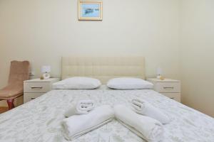Postel nebo postele na pokoji v ubytování Spacious 4 Bedroom Dubrovnik Apartment
