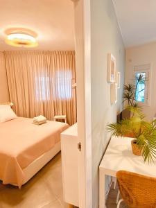 Katil atau katil-katil dalam bilik di La Casita de la Playa-Bungalow