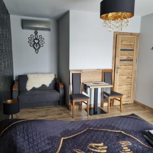 Postel nebo postele na pokoji v ubytování Willa "KomaNcza" Szczawnica