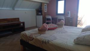 Letto o letti in una camera di Mon Ti Kaz Canot
