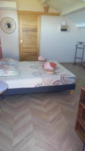 Letto o letti in una camera di Mon Ti Kaz Canot