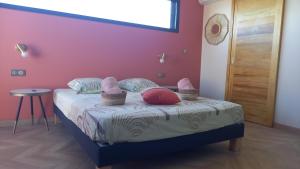 Letto o letti in una camera di Mon Ti Kaz Canot