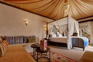 Ένα ή περισσότερα κρεβάτια σε δωμάτιο στο Palmeraie Oasis Camp - A member of Barcelo Hotel Group