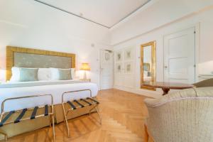 Кровать или кровати в номере Relais Villa San Martino