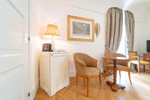 Телевизор и/или развлекательный центр в Relais Villa San Martino