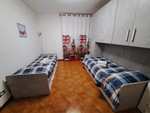 En eller flere senge i et værelse på Appartamento Giotto - Free Parking