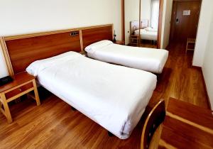 Postel nebo postele na pokoji v ubytování Hotel Los Barruecos by Croma