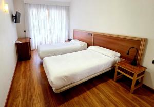 Postel nebo postele na pokoji v ubytování Hotel Los Barruecos by Croma
