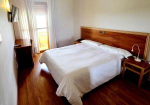 Postel nebo postele na pokoji v ubytování Hotel Los Barruecos by Croma