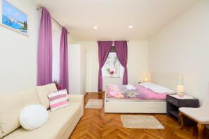 Postel nebo postele na pokoji v ubytování Spacious 4 Bedroom Dubrovnik Apartment